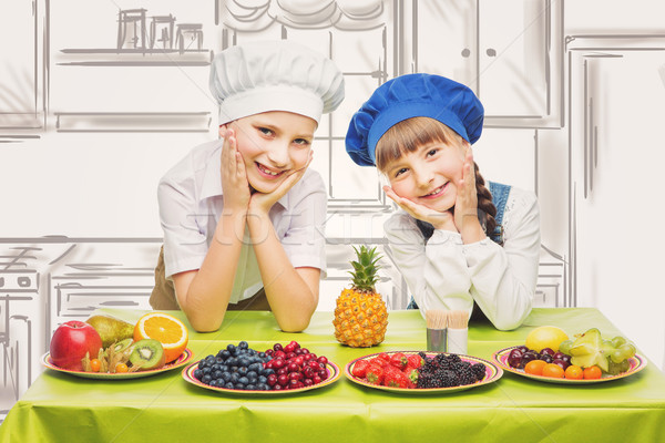 Children making fruit snacks Stock photo © svetography