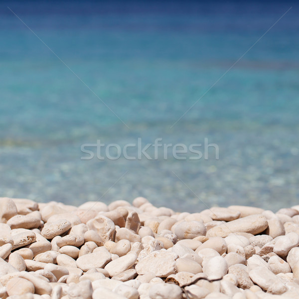 Mare ciottoli primo piano view blu acqua Foto d'archivio © svetography