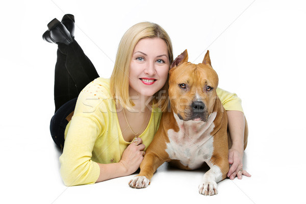 Stock photo: Girl hugging dog