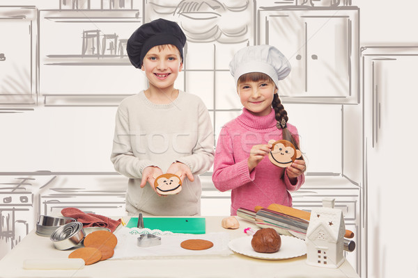 Children making christmas cookies Stock photo © svetography