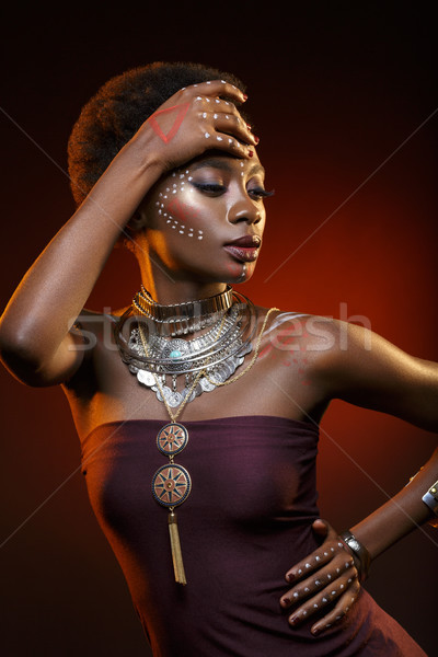 Beautiful afro girl with drawings on skin Stock photo © svetography