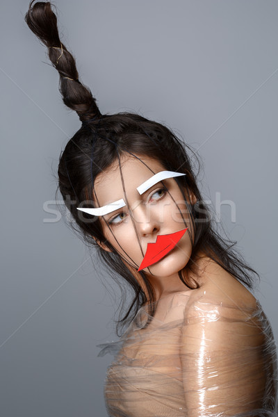 Piękna dziewczyna twarz piękna młoda kobieta dziwny fryzura Zdjęcia stock © svetography