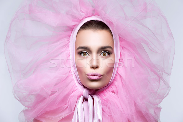 Gyönyörű lány bolyhos rózsaszín fejviselet gyönyörű boldog Stock fotó © svetography