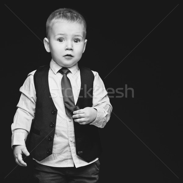 şaşırmış küçük erkek sevimli iş takım elbise Stok fotoğraf © svetography