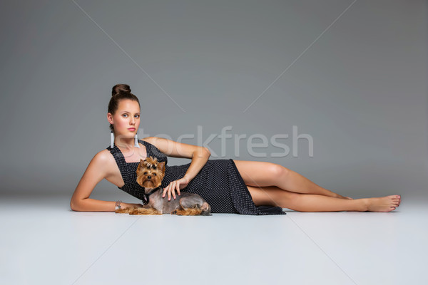 Girl with yorkie dog Stock photo © svetography