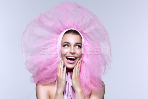 Beautiful girl in fluffy pink headwear Stock photo © svetography