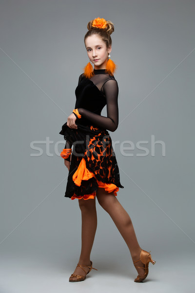 Beautiful ballroom dancer in salsa dress Stock photo © svetography
