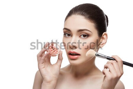 Beautiful girl holding blush container Stock photo © svetography