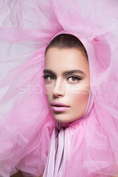 Gyönyörű lány bolyhos rózsaszín fejviselet gyönyörű fiatal nő Stock fotó © svetography