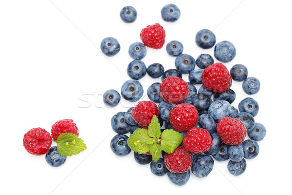 blueberry and raspberry berries isolated on white background Stock photo © svetography