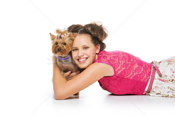Stock photo: Girl with yorkie dog