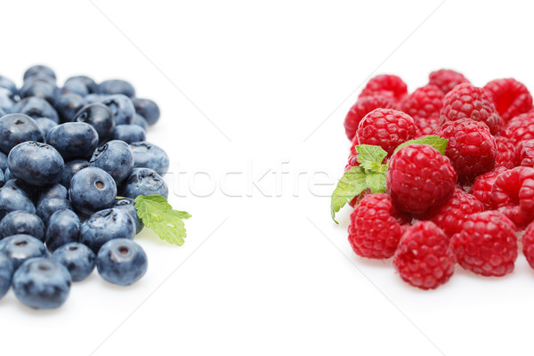blueberry and raspberry berries isolated on white background Stock photo © svetography