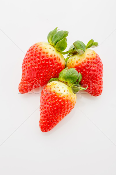 Closeup of not fully ripe strawberries Stock photo © svetography
