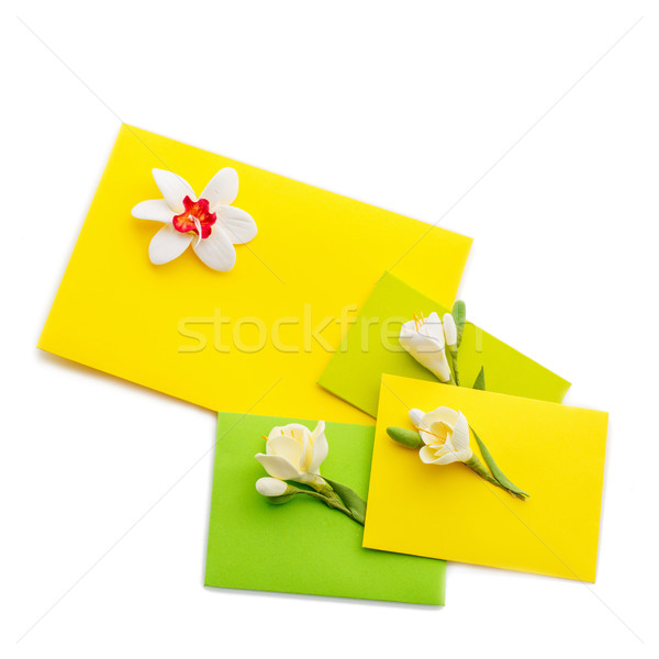 Close up of three yellow envelope with flowers Stock photo © svetography