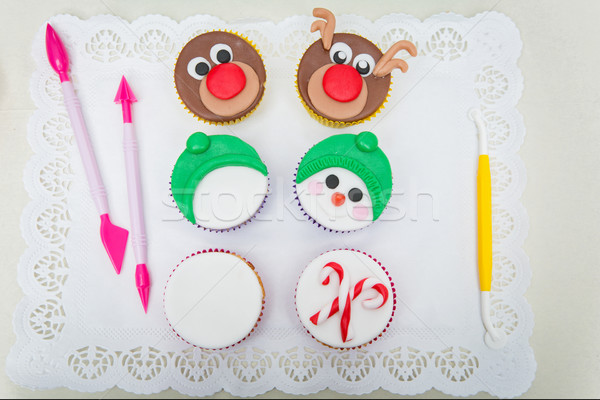 Closeup of funny christmas cupcakes Stock photo © svetography