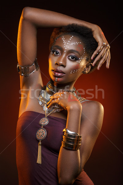 Beautiful afro girl with drawings on skin Stock photo © svetography