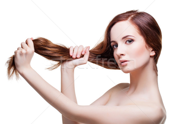 Beautiful girl with long strong hair Stock photo © svetography