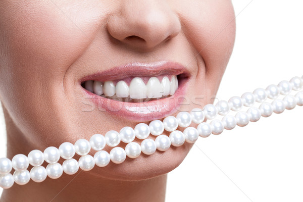 Gülen kız beyaz diş güzel genç kadın beyaz Stok fotoğraf © svetography