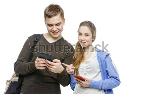 Teen boy and girl standing with mobile phones Stock photo © svetography