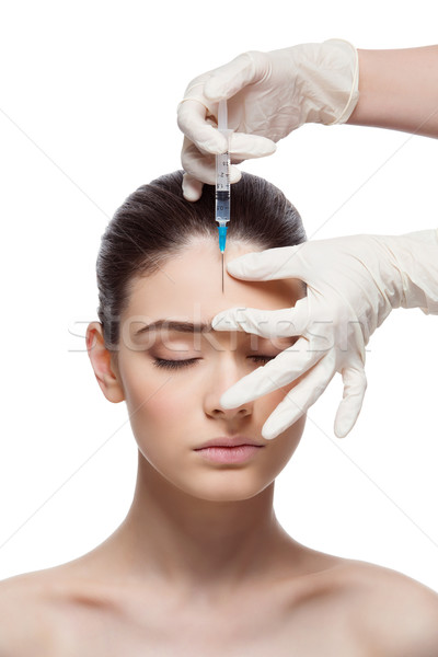 Woman gets collagen injection Stock photo © svetography