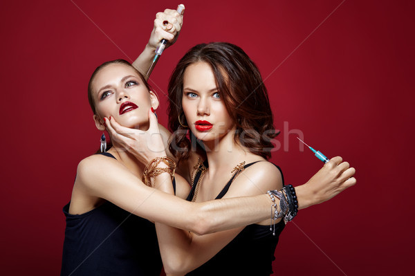 glam girls getting beauty injection Stock photo © svetography