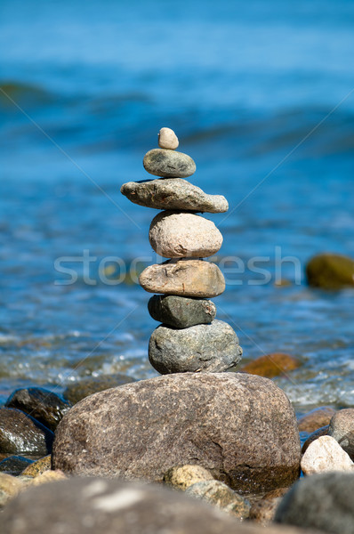 Kamień wieża plaży niebieski wody Zdjęcia stock © szabiphotography