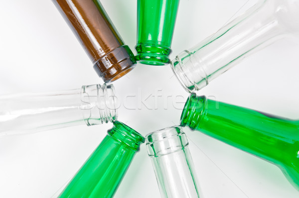 Stock photo: Glass bottles of mixed colors including green, clear white, brow