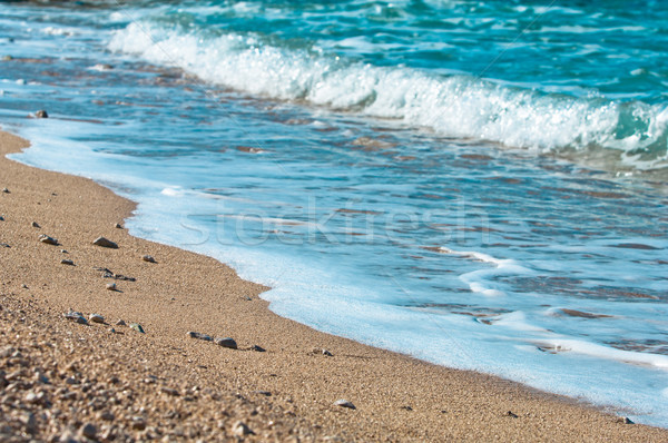 Sea view pebble beach and turquoise water tranquil scene Stock photo © szabiphotography