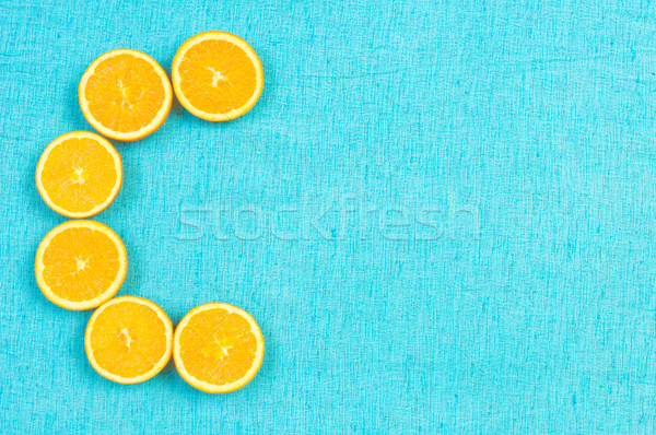 Orange and lemon citrus fruit pattern on light blue background Stock photo © szabiphotography