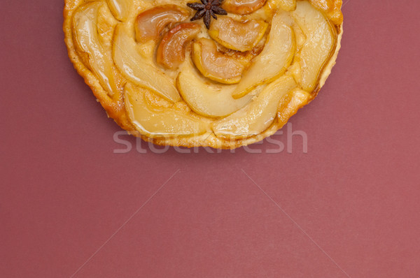 Tarte Tatin apple pear tart isolated on claret background Stock photo © szabiphotography