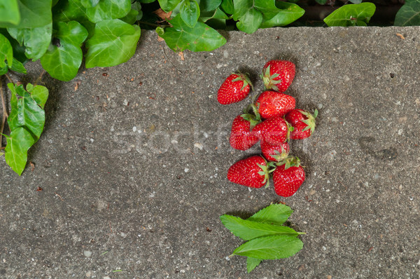 Delicious ripe strawberry  on  grey stone flat lay Healthy fruit Stock photo © szabiphotography