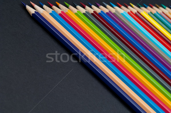 Color pencils isolated on black background close up Stock photo © szabiphotography