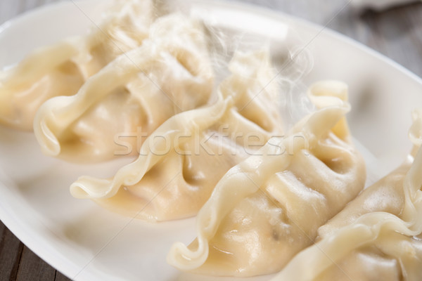 Asian chinesisches Essen frischen Knödel Platte Stock foto © szefei