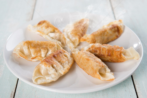 Asian repas pan frit fraîches plaque Photo stock © szefei