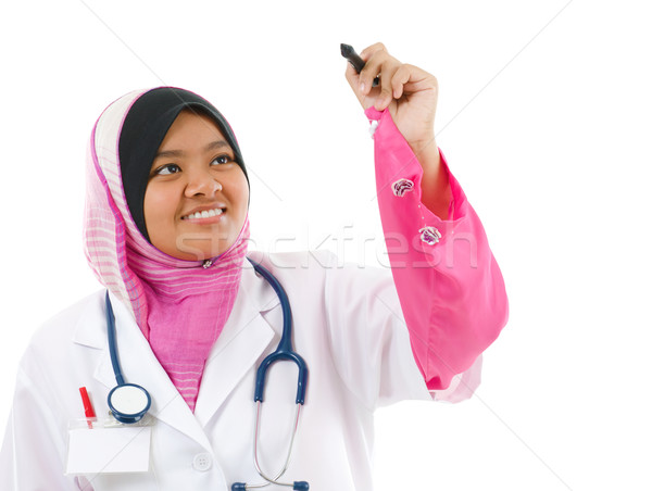 Délkelet ázsiai muszlim orvostanhallgató átlátszó képernyő Stock fotó © szefei