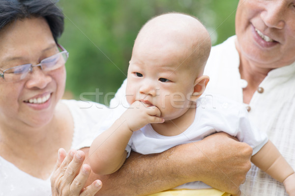 Asian grandparents and grandson Stock photo © szefei