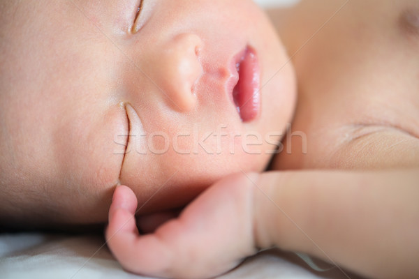 Close up Asian newborn baby sleeping Stock photo © szefei