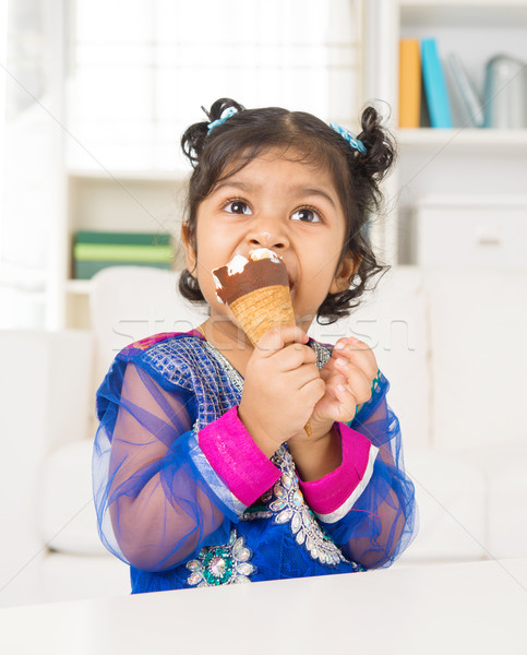 Stock photo: Eating ice cream at home.