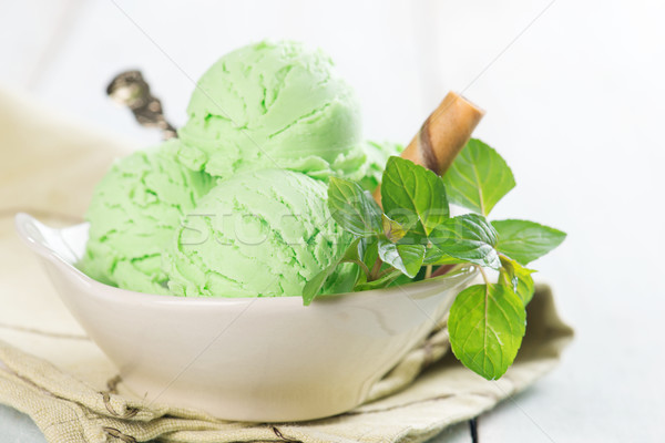 Matcha ice cream in bowl Stock photo © szefei