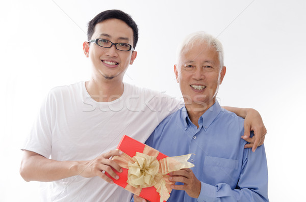Jour de pères heureux asian vieux père en fils main [[stock_photo]] © szefei