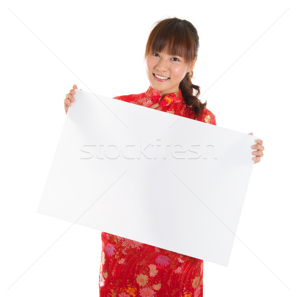 Chinese cheongsam girl holding placard Stock photo © szefei