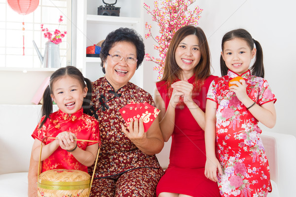 Multi generations Asian family celebrate Chinese new year Stock photo © szefei