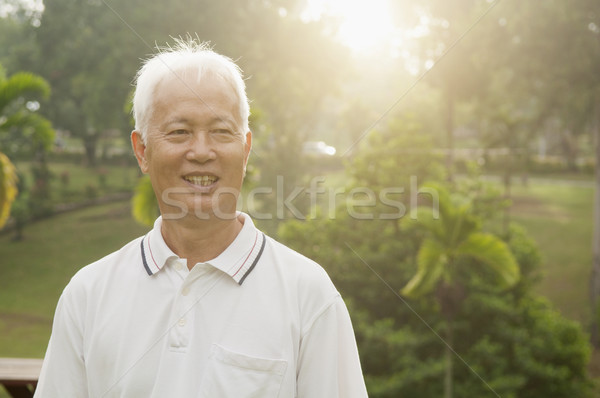 Сток-фото: азиатских · человека · улыбаясь · Открытый · парка