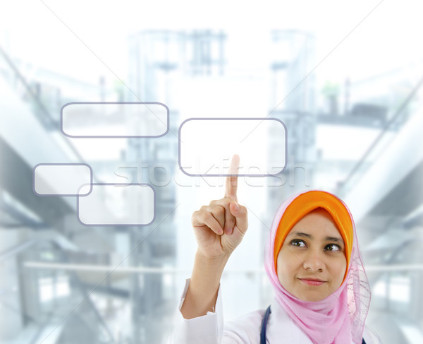 Orvosi fiatal muszlim női orvos ujj Stock fotó © szefei