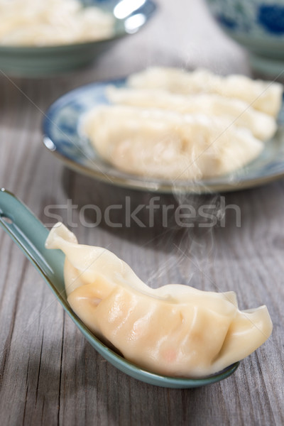 Delicious Chinese cooking fresh dumplings Stock photo © szefei