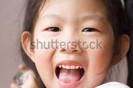 Asia nina primer plano tiro jóvenes sonrisa Foto stock © szefei
