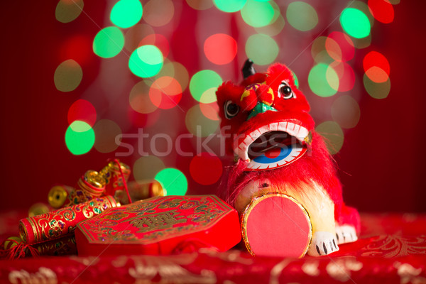 Chinese New Year decorations on red glitter background Stock photo © szefei