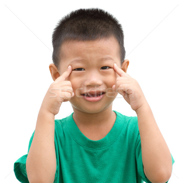 Asian child pointing eyes Stock photo © szefei