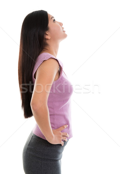 Asian young woman looking up Stock photo © szefei