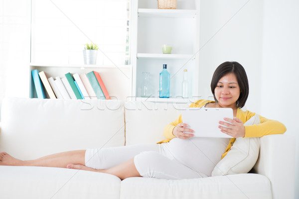 Stockfoto: Asian · zwangere · vrouw · mooie · vergadering · sofa